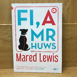 Paperback book cover of 'FI, a Mr Huws' by Mared Lewis, featuring a white background with red and blue text, and an illustration of a dog.