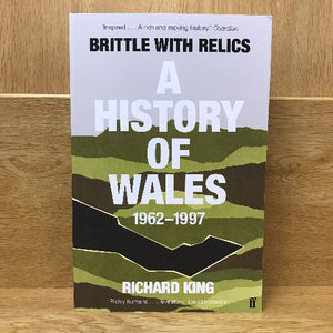 The cover of the book 'Brittle with Relics - A History of Wales 1962-1997' by Richard King. The cover has a green and brown color scheme with text overlay.