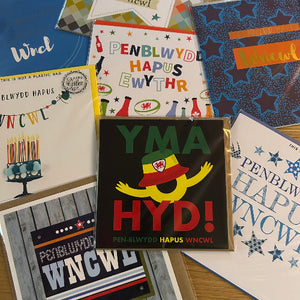 Collection of greeting cards with various designs and text.