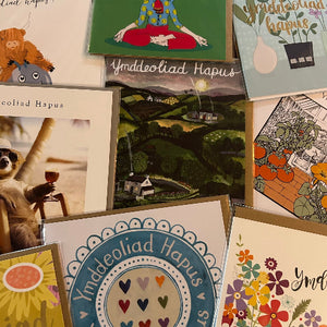 Collection of greeting cards with various designs and text