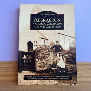 Book titled 'Aberaeron: A Chanol Ceredigion and Mid Ceredigon' with a vintage photograph on the cover against a blue background.