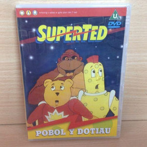 DVD cover of 'Superted' featuring animated bear and sponge characters against a space-themed backdrop with 'Pobol y Dotiau' text.