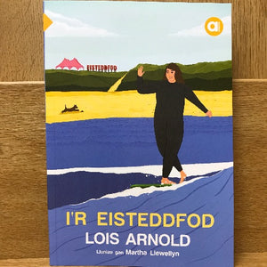 Book cover of 'Ir Eisteddfod' featuring an illustration of a woman walking by the sea with a landscape in the background, indicating it is a Welsh language novel for learners.