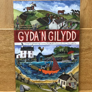 A colorful book cover featuring illustrations of Welsh landscapes and a title 'GYDA'N GILYDD' displayed prominently at the top.