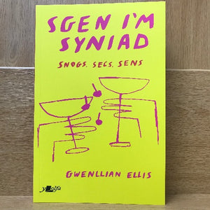 This image features the vibrant cover of the book "Sgen I'm Syniad" by Gwenllian Ellis. The cover design is striking with its bright yellow background and pink illustrations depicting glasses and cherries, adding a playful yet sophisticated touch.