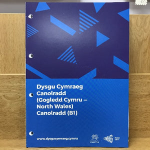 A cover of a Welsh language coursebook for adults, titled 'Dysgu Cymraeg Canolradd (Gogledd Cymru - North Wales) Canolradd (B1)', with a blue background and geometric shapes.