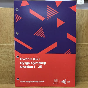 A coursebook titled 'Uwch 2 (B2) Dysgu Cymraeg Unedau 1-25' with a red and blue geometric patterned cover.