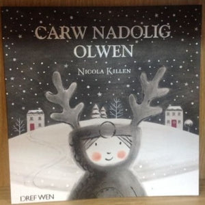A book cover for 'Carw Nadolig Olwen' featuring an illustration of a reindeer with a Christmas theme.