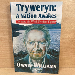 Paperback book cover of 'Tryweryn: A Nation Awakes' featuring an portrait of Owain Williams with a body of water and a landscape in the background.