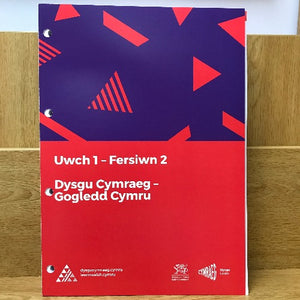 A book cover for 'Dysgu Cymraeg: Cwrs Uwch 1 Gogledd Cymru (Fersiwn 2)' with red and blue design elements on a white background.
