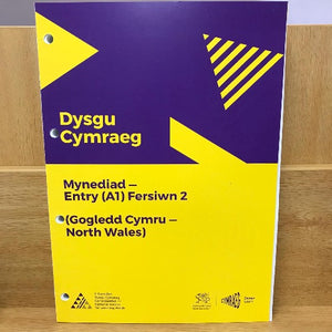A book cover for 'Dysgu Cymraeg: Mynediad - Entry (A1) Fersiwn 2 - Gogledd Cymru' with yellow and purple design elements on the cover.