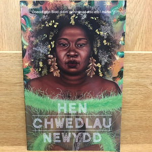 Book cover of 'Hen Chwedlau Newydd' featuring an illustration of a woman with flowers and leaves around her, suggestive of a mythological or fairy tale character.