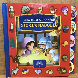 A colorful board book titled 'Chwilio a Chanfod: Stori'r Nadolig' with illustrations of characters in a Christmas story, written in both English and Welsh.