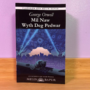 Book cover of 'Mil Naw Wyth Deg Pedwar' by George Orwell with a purple background