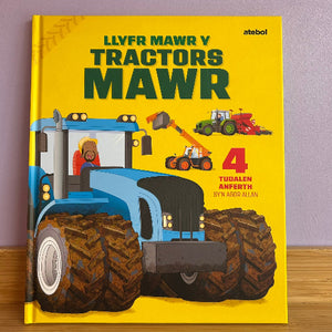Book cover of 'Tractors Mawr' with a large blue tractor illustration on a yellow background.