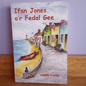 Book cover of 'Ifan Jones a'r Fedal Gee' by Harri Parri with a coastal scene illustration.