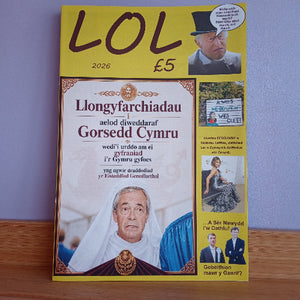 A physical magazine or booklet titled 'LOL 2026' with a yellow cover.