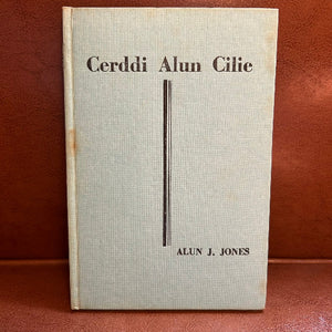 Book titled 'Cerddi Alun Cilie' by Alun J. Jones on a brown background