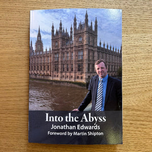 Book cover of 'Into the Abyss' by Jonathan Edwards with a man and Palace of Westminster in the background.