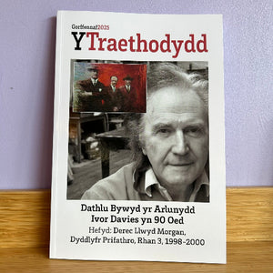Book cover of 'Y Traethodydd' with a portrait of an elderly man and a smaller inset image on a purple wall.