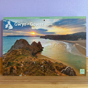 Calendar cover with a scenic beach and cliffs