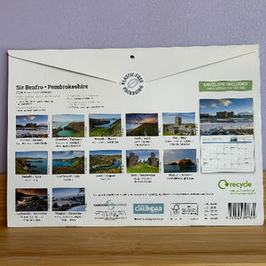 Calendar packaging with images of landscapes.