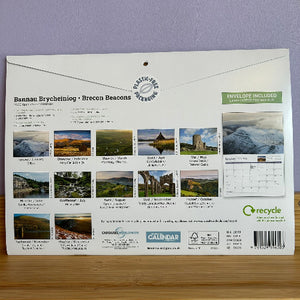 Calendar packaging with scenic images and text 