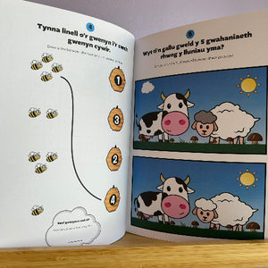 Open book with educational content.