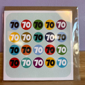 Card with '70' in various colors on a light green background