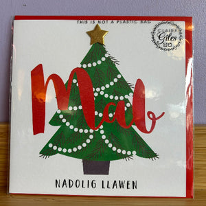 Card with a Christmas tree design and text