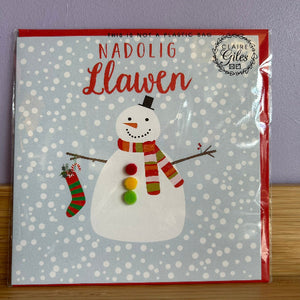 Packaged product with a snowman design and text on a gray background