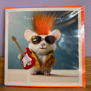 Card with a mouse wearing sunglasses and a Mohawk, holding a guitar, on a blue background.