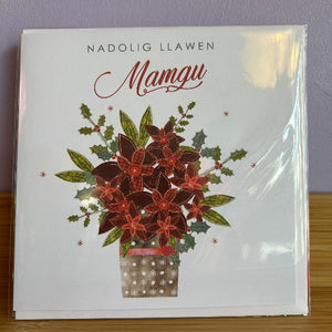 Christmas card with poinsettia design and 'Nadolig Llawen' text on a white background.