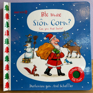 Children's book cover with Santa Claus, reindeer, and snowman on a blue background