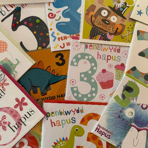 Collection of colorful children's cards with numbers and animals