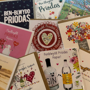 Collection of greeting cards with various designs and text.