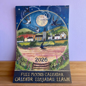 2026 Full Moons Calendar with a colorful illustration of birds, moon, and village on a purple background.